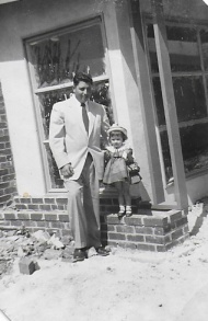 Dad and Cammie, Easter of 1955...moving into the new house